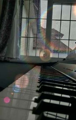 Ánh dương chiếu sau bản nhạc trong mưa